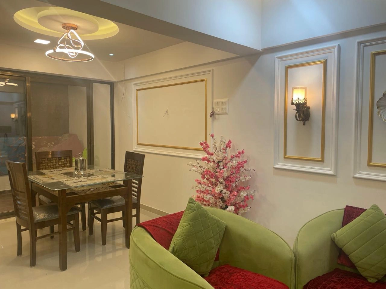 Living and dining with ornate ceiling
